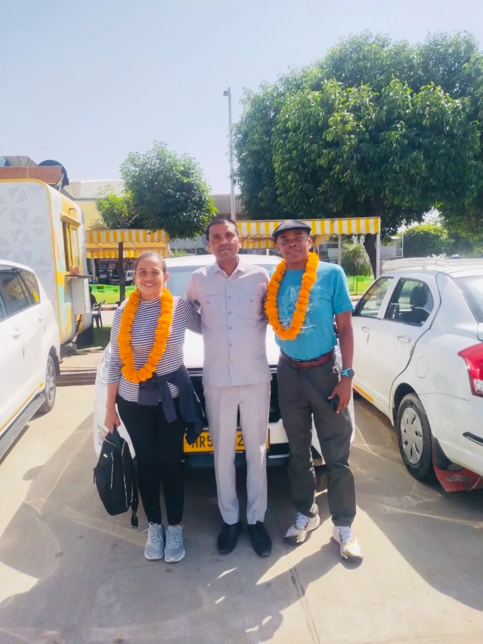 Two people with flowers